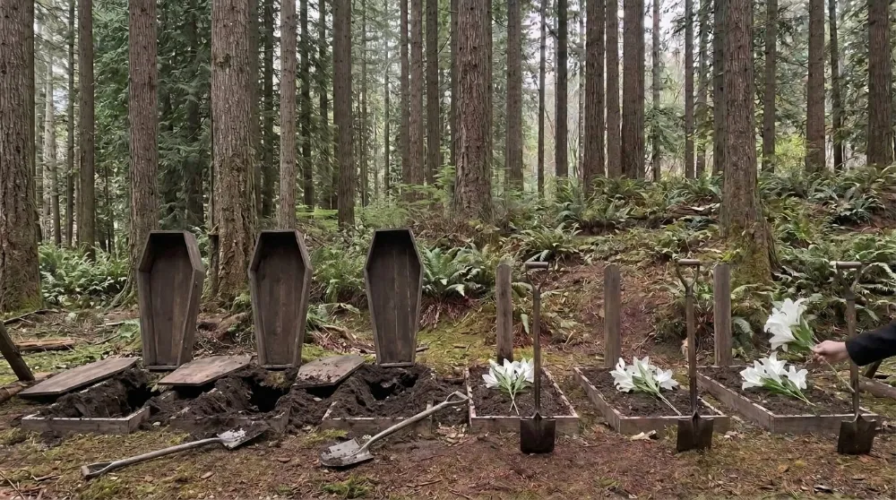 Buried Alive: lilies laid on the caskets